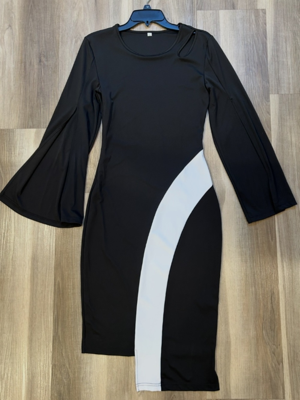 Black Dress with White Curve Accent